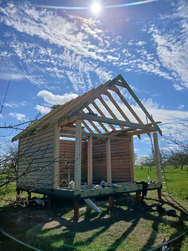 €8,000 walls and rafters only, without roof covering. 5x4.8m + 2m terrace. Dovetail corner joint.